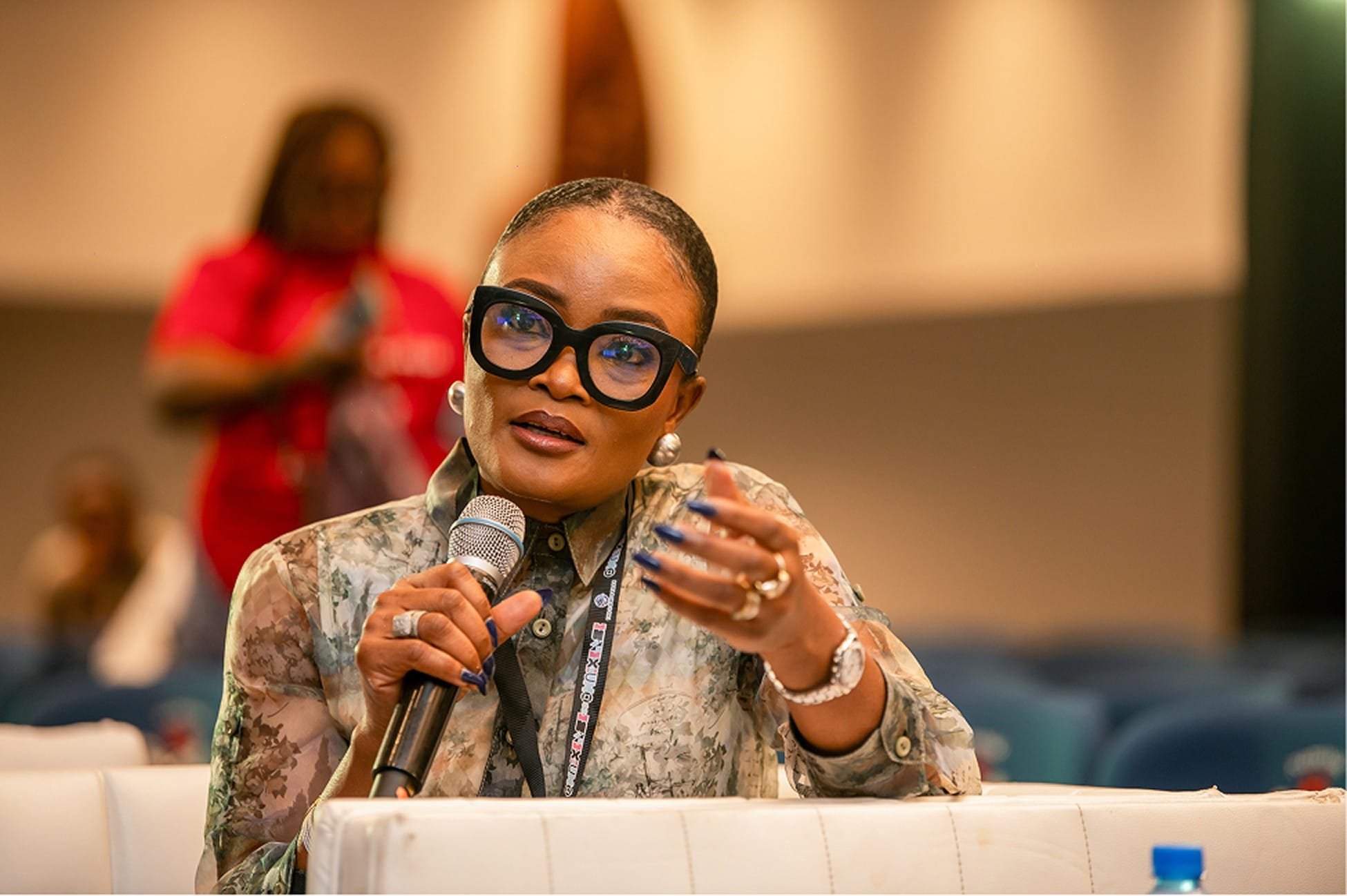 Oiza Nicholson speaking on a panel