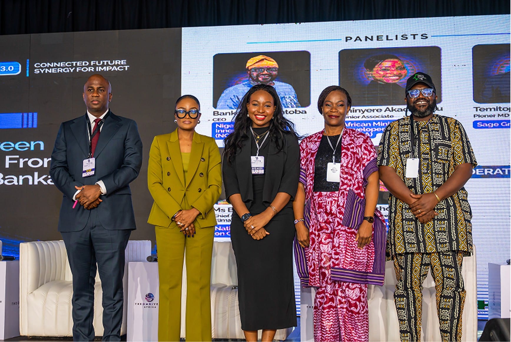 Panellists on stage at the summit